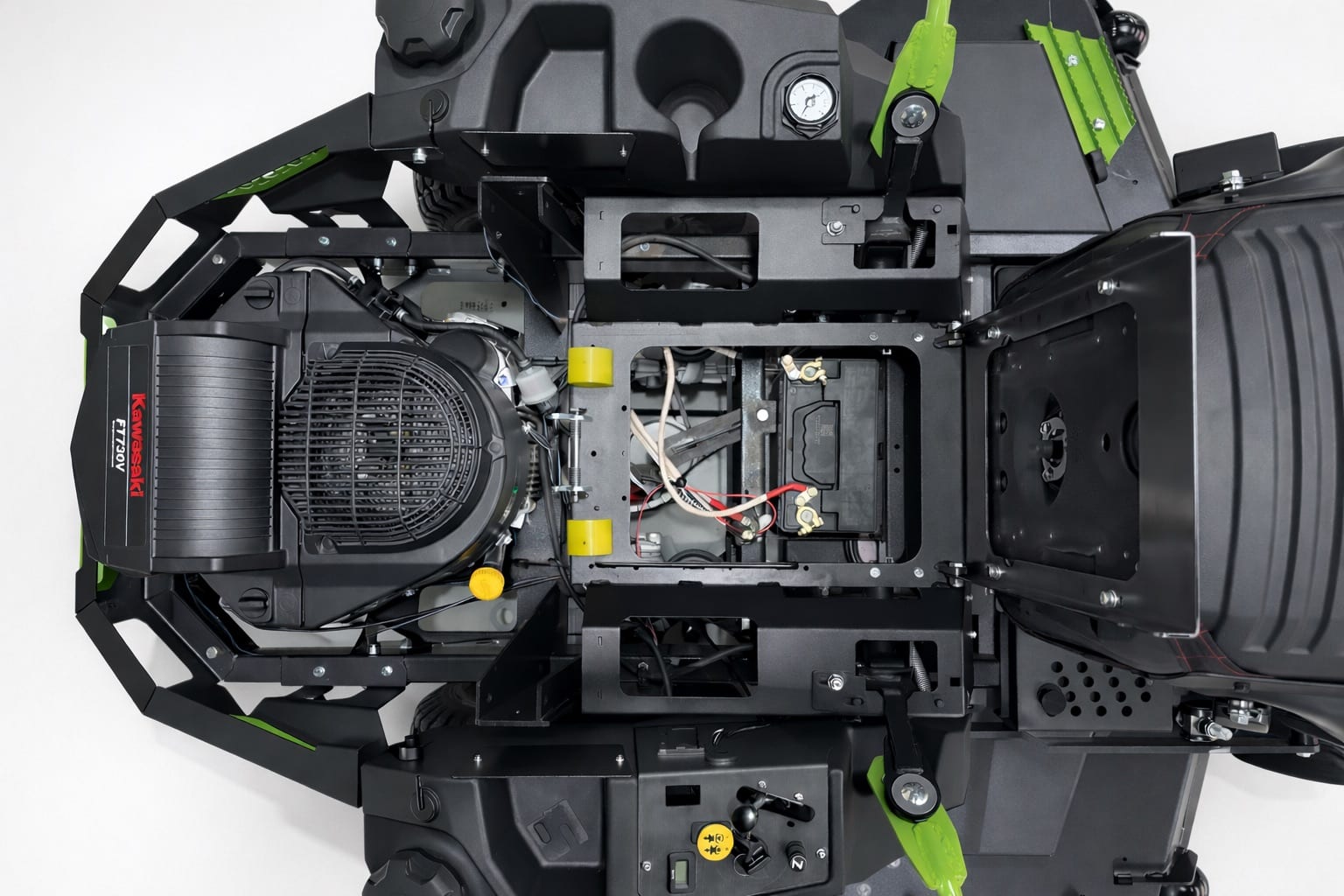 Top-down view of engine bay with Kawasaki FT730 engine and battery tray