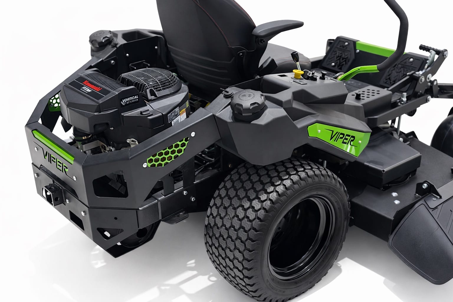 Studio close-up of Kawasaki engine, fuel cap and rear tire