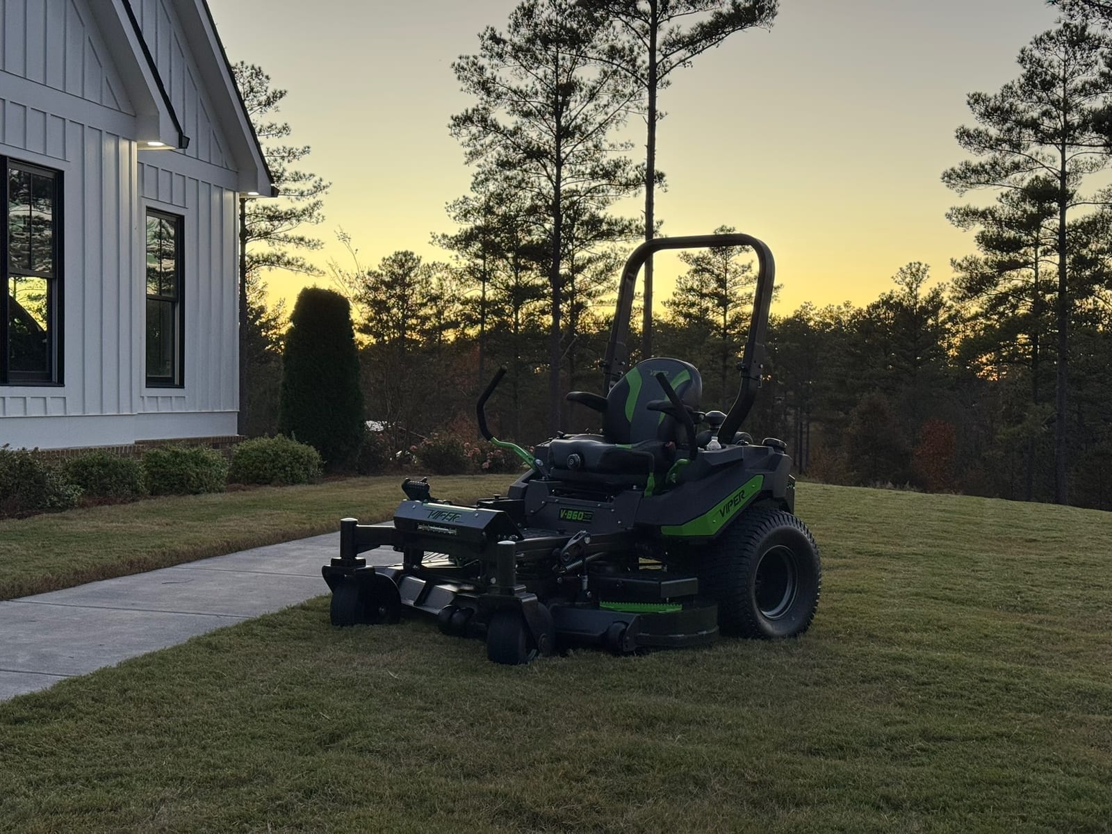 Viper by farmhouse at golden hour, side three-quarter